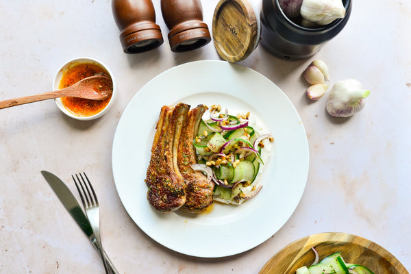 Garlic lamb chops with cucumber and labneh