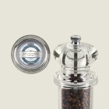 #salt&pepperset
The Cole & Mason 505 Salt & Pepper Mills range includes a clear acrylic pepper grinder filled with peppercorns, adjustable settings, and a top-down view of the Cole & Mason logo on the cap against a pale solid background.