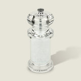 #salt
The Cole & Mason 505 Salt & Pepper Mill stands upright on a light gray background. This clear acrylic grinder features adjustable settings for customizable seasoning.