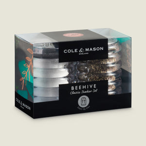The Cole & Mason Beehive Shakers Set includes salt and pepper dispensers with clear, ribbed acrylic bodies and silver tops, presented in branded packaging.