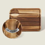The Cole & Mason Berden Carving Board & Ashden Mezzaluna Bundle features a grooved acacia wood board with a bowl and dual-handled mezzaluna—perfect as an elegant herb chopping set.