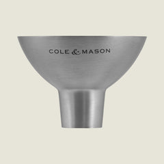 The Cole & Mason Dover Stainless Steel Funnel is an easy-to-clean kitchen essential, designed for effortless pouring and featuring signature Cole & Mason branding against a light, pale background.