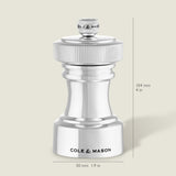 The Cole & Mason Hoxton Silver Plated Salt & Pepper Mill Set features elegant mills with ridged tops, engraved branding, and dimensions of 104 mm tall by 50 mm wide—ideal for stylish dining or sophisticated kitchen décor.