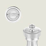 Close-up of the Hoxton Silver Plated Salt & Pepper Mill Set by Cole & Mason, showcasing detailed base labeling and an S-marked top knob for refined dining, set against a light, neutral background.
