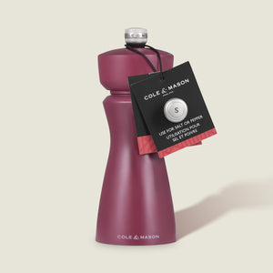 A Cole & Mason Kenton Salt & Pepper Mill in Sichuan Pepper, featuring a ceramic mechanism, silver top knob, and black tag, is shown against a light background.