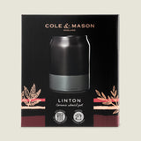 The Cole & Mason Linton Ceramic Utensil Pot features a sleek black and gray design with decorative leaf illustrations, perfect for organizing kitchen utensils. Supplied in a branded box, its ceramic lining ensures easy access and stylish storage.