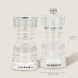 The Cole & Mason London Acrylic Salt Shaker & Pepper Mill Set includes clear, 130mm tall grinders, each 57mm wide—sleek and ideal for modern tableware settings.
