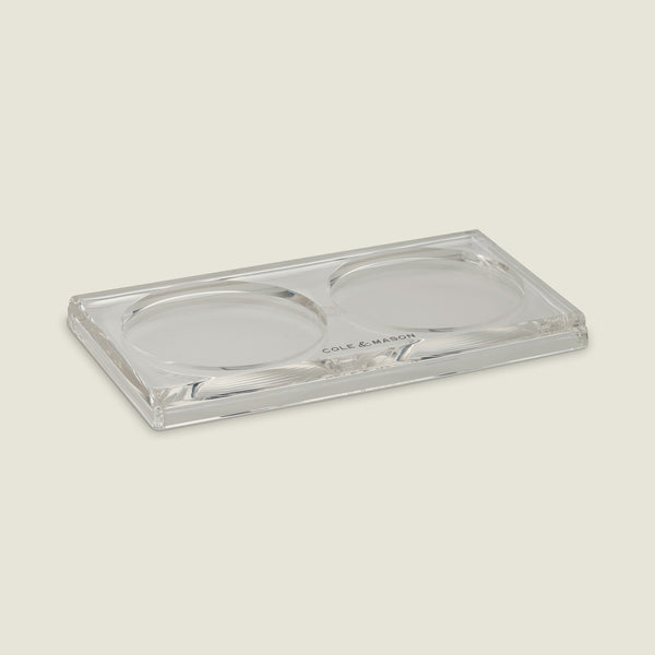The Cole & Mason Ramsgate Acrylic Mill Tray features a clear rectangular design with two round indents for holding Salt and Pepper Mills, and has Cole & Mason printed at the edge to suit any light kitchen background.