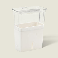The Cole & Mason UK Burwell Self Watering Potted Herb Keeper Small and Tealby Herb Keeper are transparent rectangular containers with white bases and clear lids, ideal for storing and self-watering herbs using absorbent pads to keep them fresh.