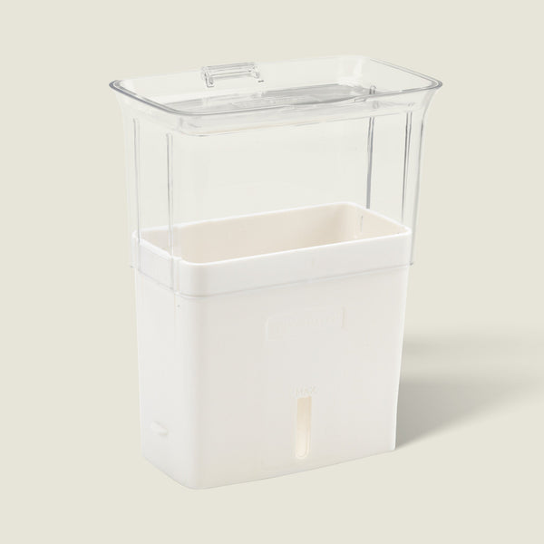 The Cole & Mason UK Burwell Self Watering Potted Herb Keeper Small and Tealby Herb Keeper are transparent rectangular containers with white bases and clear lids, ideal for storing and self-watering herbs using absorbent pads to keep them fresh.